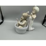 Lladro Girl in Tub Having Hair Brushed