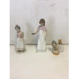 Nao girl figurine and two other Spanish examples.