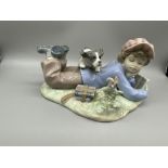 Lladro Boy Laying with Hat Bird and Dog