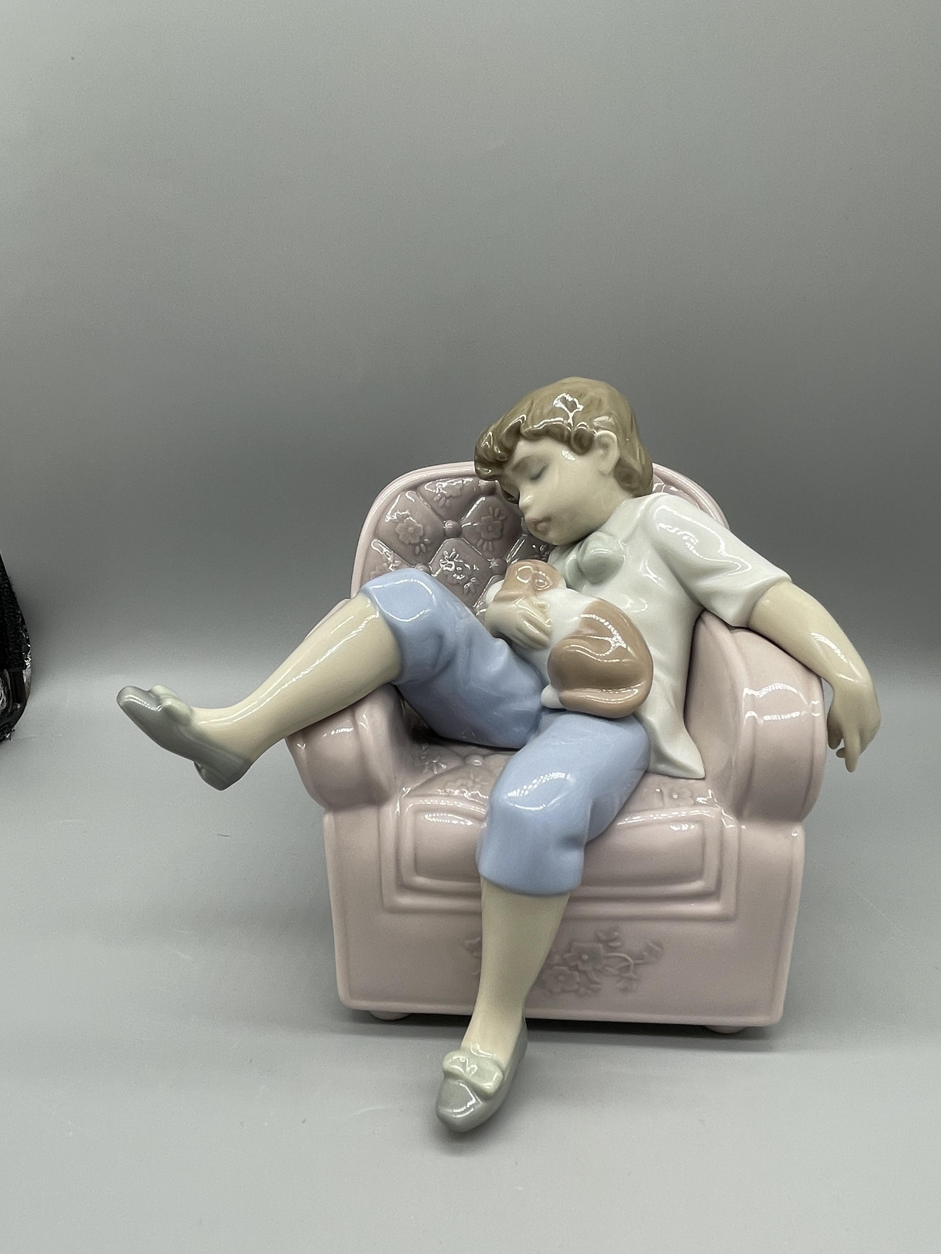 Lladro Boy in Chair with Pup