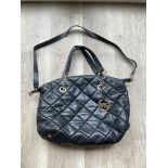 Michael Kors ladies handbag with quilted body.