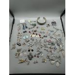 Large quantity of earrings to include silver examp