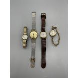 Four vintage watches, not working