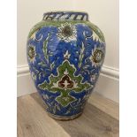 19th C Persian floral vase 29cm high.