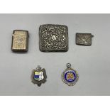 HM Silver items to include fobs, stamp book, vesta