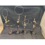 Four Bronze ballerina`s with hoops, 82cm. the high