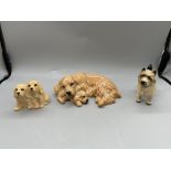 One Royal Doulton and Two Beswick dog figures