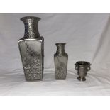 Two Pewter vases and one another