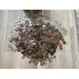 Quantity of mixed GB coins and pennies