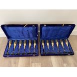 Two boxes of brass Champagne flutes. twelve in tot