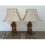 Pair of modern cherub lamps, gilded and with shade