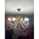 A set of beautiful Gold Plated Chandeliers adorned