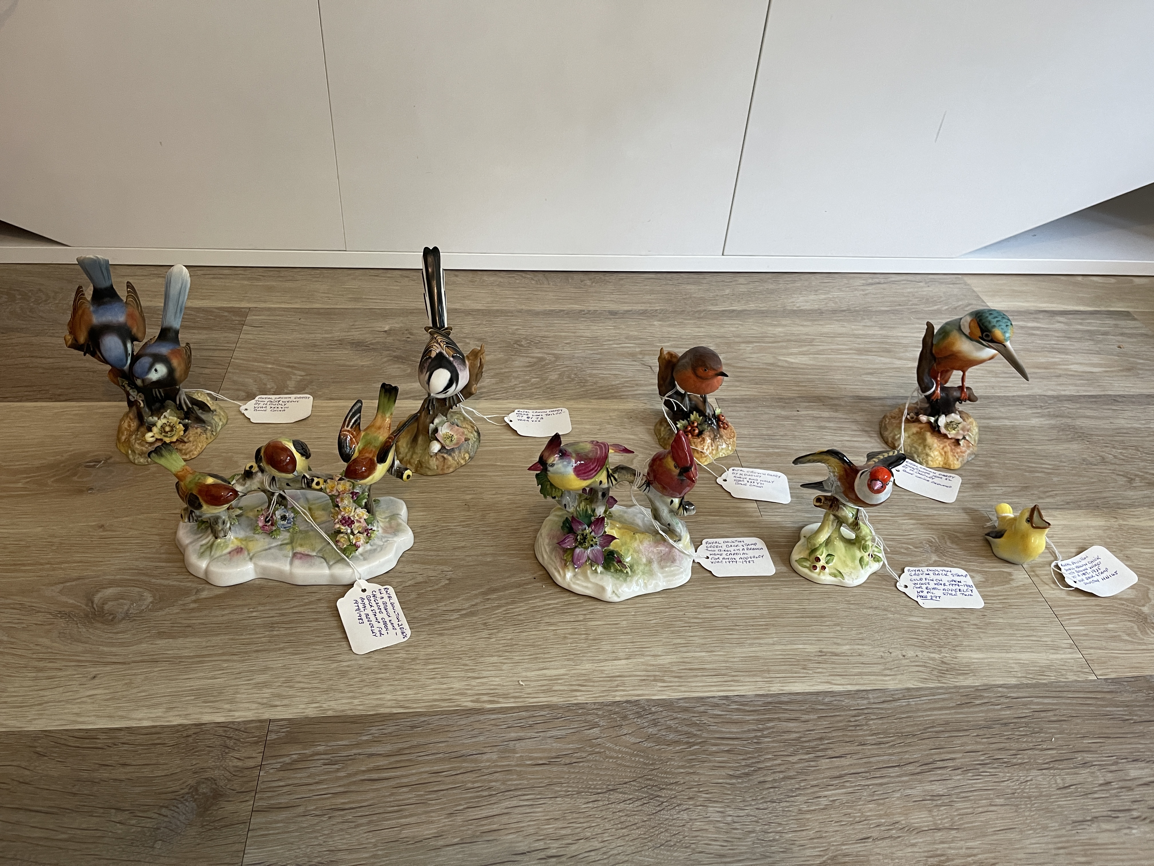 Eight Royal Crown Darby and Royal Doulton Bird Fig