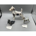 Three Terrier Dog Figurines. All in great ondition