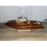 Aero Naut "Diva" Boat on Wooden Stand