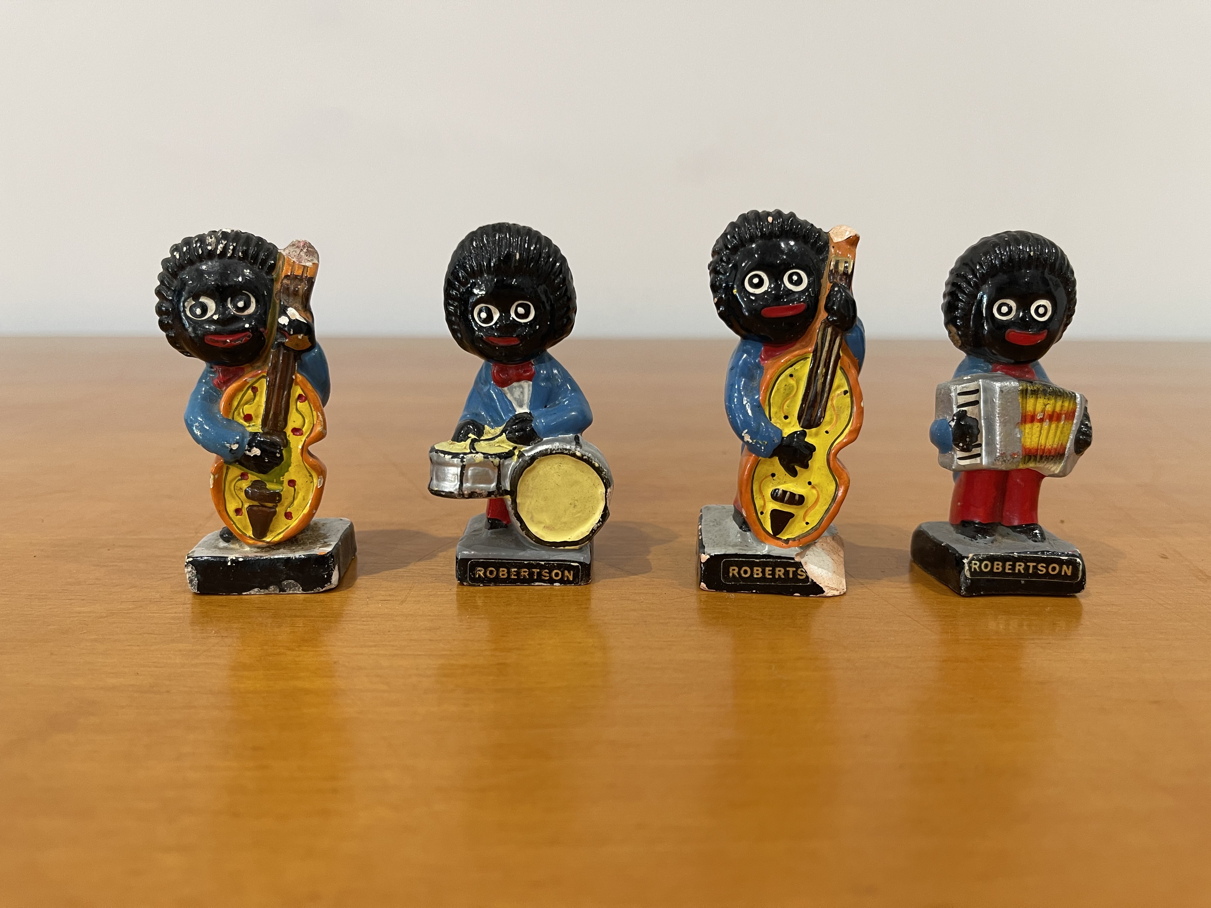 A Group of Vintage Robertson's Plaster Jazz Band F