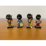 A Group of Vintage Robertson's Plaster Jazz Band F