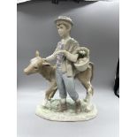 Taking cow to market, Lladro figureLladro boy and