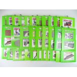 A quantity of OO Gauge cardboard building kits by METCALFE - mostly sealed as new (32)