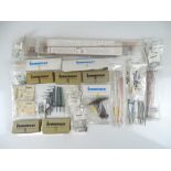 A large quantity of HO Scale catenary, masts and components by SOMMERFELDT - VG some in sealed