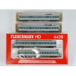 A FLEISCHMANN HO Gauge 4438 2-car diesel railcar together with two additional 4439 centre cars -