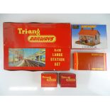 A quantity of TRI-ANG/HORNBY OO Gauge station sets together with a Bell Inn building kit - appear