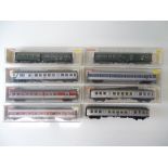 A group of mostly boxed HO Gauge German Outline passenger coaches by FLEISCHMANN - G in G boxes (