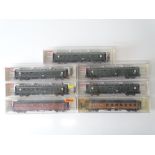 A group of boxed German Outline HO Gauge passenger coaches - mostly in DB green livery by