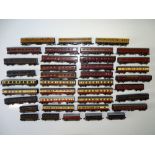 A large quantity of N Gauge passenger coaches by various manufacturers together with some kit