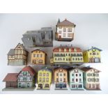 A group of HO Scale kit built plastic buildings by KIBRI, FALLER etc. - Built to a good / very