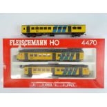 A FLEISCHMANN HO Gauge Dutch Outline 4470 2-car NS Sprinter EMU with additional unboxed centre