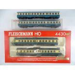 A FLEISCHMANN HO Gauge 4430 2-car diesel railcar together with two unboxed centre railcars -