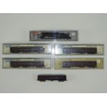 A group of N Gauge Japanese Outline items by KATO to include a steam locomotive and 5 vintage