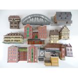 A group of HO Scale kit built plastic and cardboard buildings by KIBRI, FALLER etc. - Built to a
