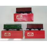 A trio of HORNBY DUBLO 4-wheel vans to include 2 x 4305 Passenger Fruit vans and 1 x 4323 SR Utility