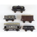 A group of O Gauge coarse scale scratch built wagons as lotted - generally G - some storage wear and
