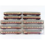 A group of HO Gauge German Outline passenger coaches in TEE livery by FLEISCHMANN - G in G boxes (10