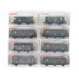 A group of HO Gauge German Outline 4 and 6 wheel passenger coaches by FLEISCHMANN - G in G boxes (