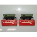 A pair of HORNBY DUBLO late issue 4644 21-ton Hopper wagons in BR grey livery - VG in G/VG boxes (