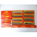 A group of OO Gauge boxed TRI-ANG/HORNBY Passenger coaches - some possibly not in original boxes - G