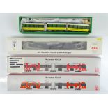 A group of HO Gauge modern outline low floor articulated tram cars - probably by LEOPOLD HALLING and