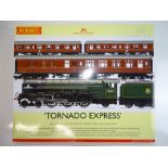 A HORNBY R3059 Tornado Express Train Pack containing an A1 Class steam locomotive 'Tornado' in BR