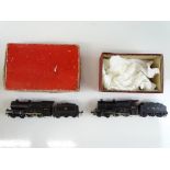 A pair of TRIX TWIN Midland Compound steam locomotives in LMS and BR liveries - boxed and part boxed