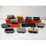 A quantity of HORNBY SERIES O Gauge rolling stock including loco, coaches and wagons from the No.