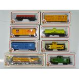 A group of American Outline HO Gauge rolling stock by BACHMANN to include: a diesel loco together