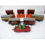 A mixed group of HORNBY SERIES wagons and coaches to include LNER 4 wheel coaches and a group of