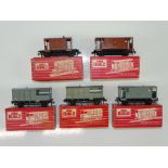 A group of HORNBY DUBLO brake vans to include an example of the 4310 LMS van in the rarer BR brown