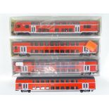 A group of HO Gauge German Outline double deck push-pull coaches by FLEISCHMANN in DB red livery -