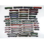A large quantity of unboxed European Outline N Gauge passenger coaches by various manufacturers -