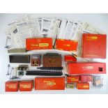 A quantity of OO Gauge building kits and accessories by TRI-ANG to also include a large quantity